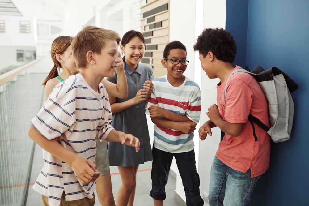 A group of smiling teenagers together